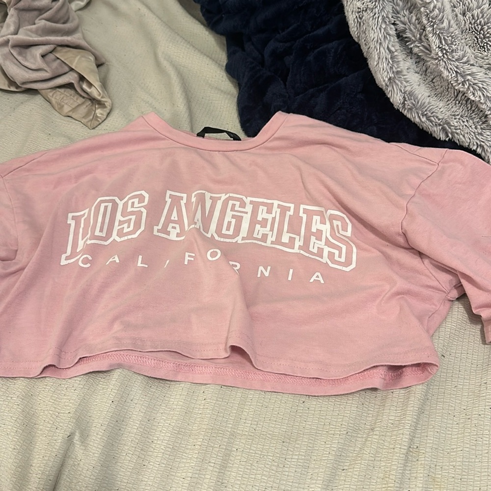pink cropped top